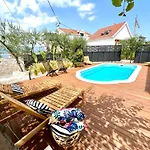 The Three Flowers Pool House *